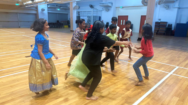 Students had fun playing Kabbadi in the school hall.